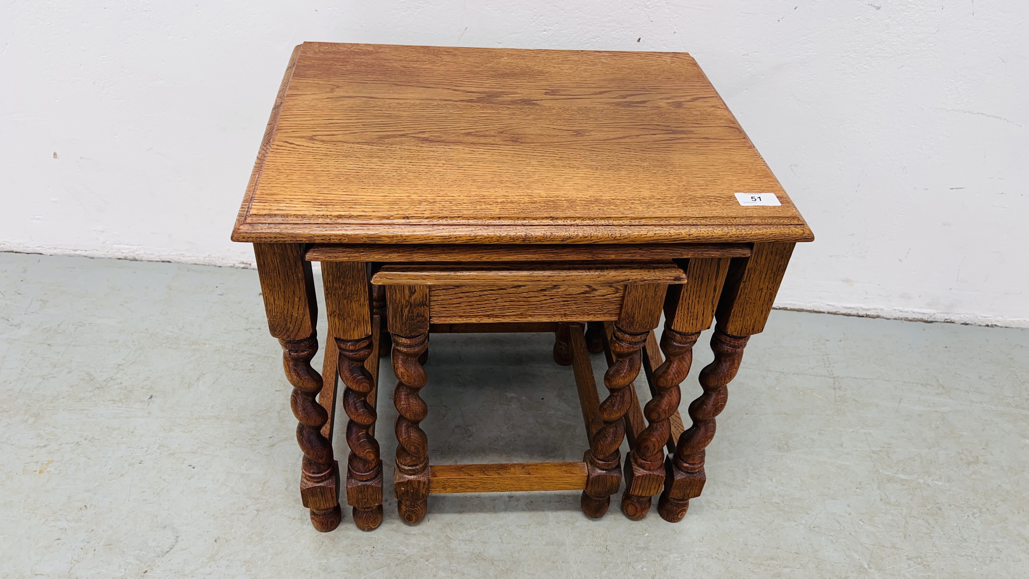 A NEST OF THREE GRADUATED OAK TABLES. - Image 2 of 5