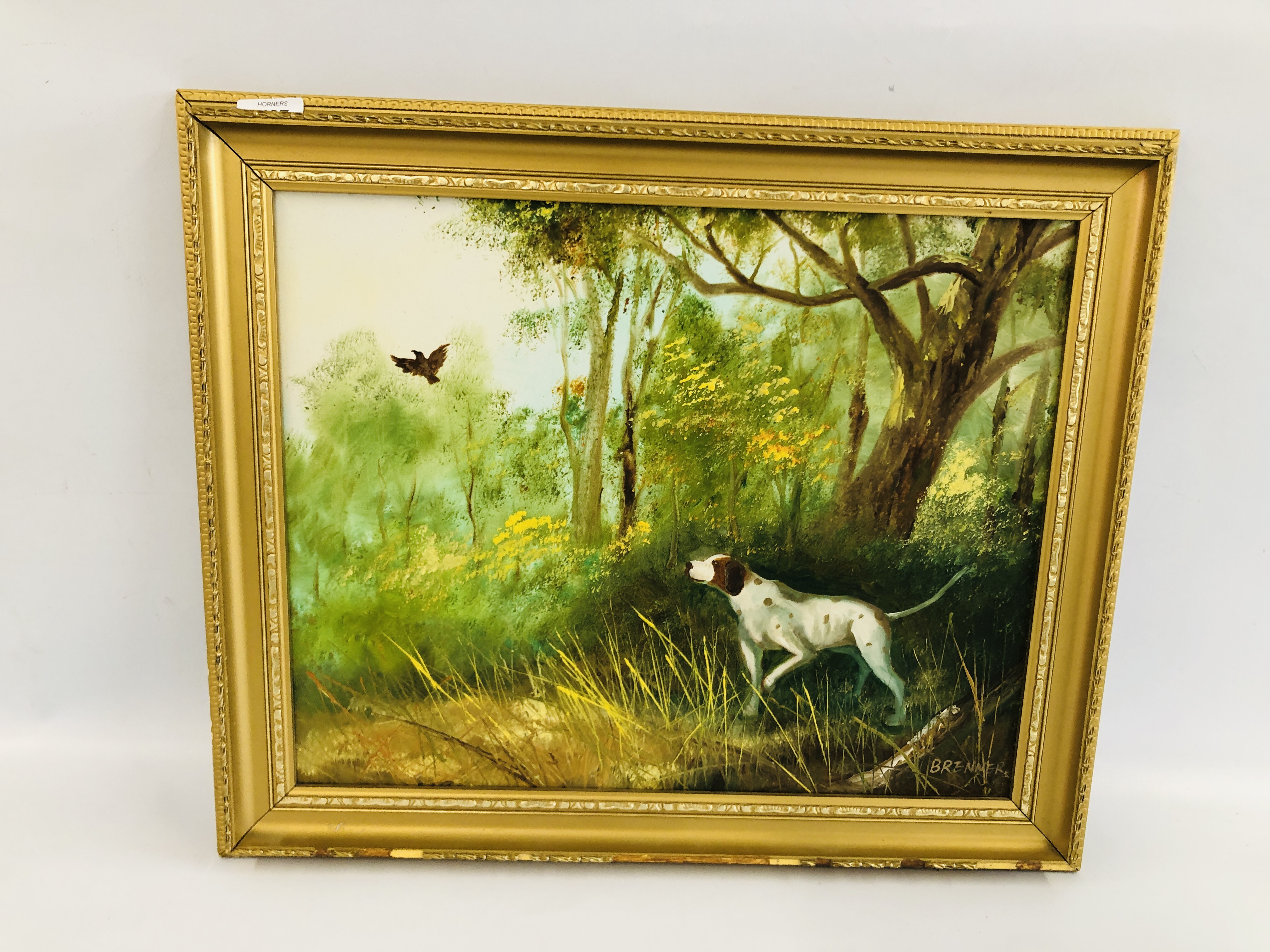 FRAMED OIL ON BOARD OF A "POINTER" GUN DOG IN COUNTRY SCENE, SIGNED "BRENNER".