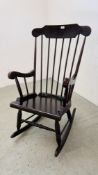 A MAHOGANY STICK BACK ROCKING CHAIR.