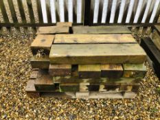 A QUANTITY OF CHUNKY TIMBER RAISED BED EDGING APPROX 15 LENGTHS,