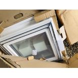 A BOXED GREY AND WHITE FRAMED VELUX WINDOW, 60 X 60.