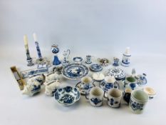 AN EXTENSIVE COLLECTION OF DELFT WARES IN TWO BOXES CONTAINING VARIOUS CANDLE STICKS,