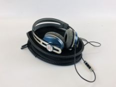 A PAIR OF SENNHEISER MOMENTUM HEADPHONES WITH ORIGINAL CASE AND INSTRUCTIONS.