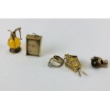 A COLLECTION OF 5 ASSORTED CHARMS TO INCLUDE 3 9CT GOLD AND 2 YELLOW METAL EXAMPLES
