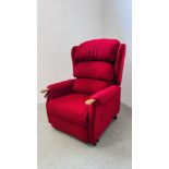 A GOOD QUALITY RED UPHOLSTERED ELECTRIC RECLINER / MASSAGER CHAIR WITH WOODEN ARMS.