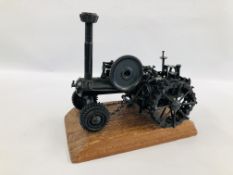 A HANDMADE METAL CRAFT MODEL OF A TRACTION ENGINE