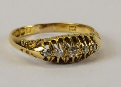 AN ANTIQUE 18CT GOLD FIVE STONE DIAMOND RING.