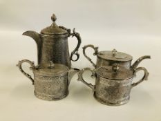 AN ELABORATE INDIAN METAL 4 PIECE TEA SET.