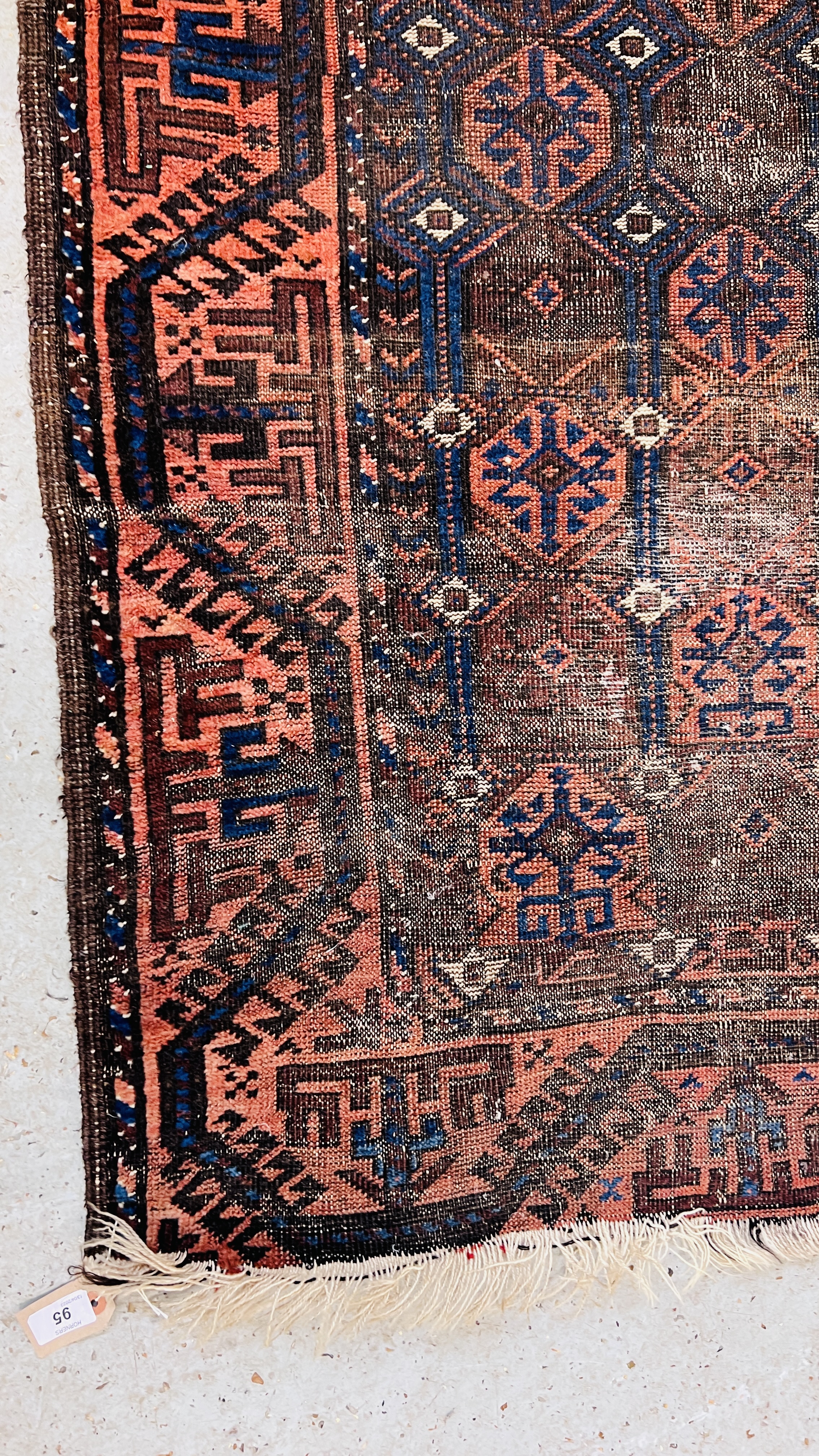 A TRADITIONAL BELOUCH RUG BLUE/ORANGE DESIGN (WORN CONDITION) 135 X 90CM. - Image 2 of 7