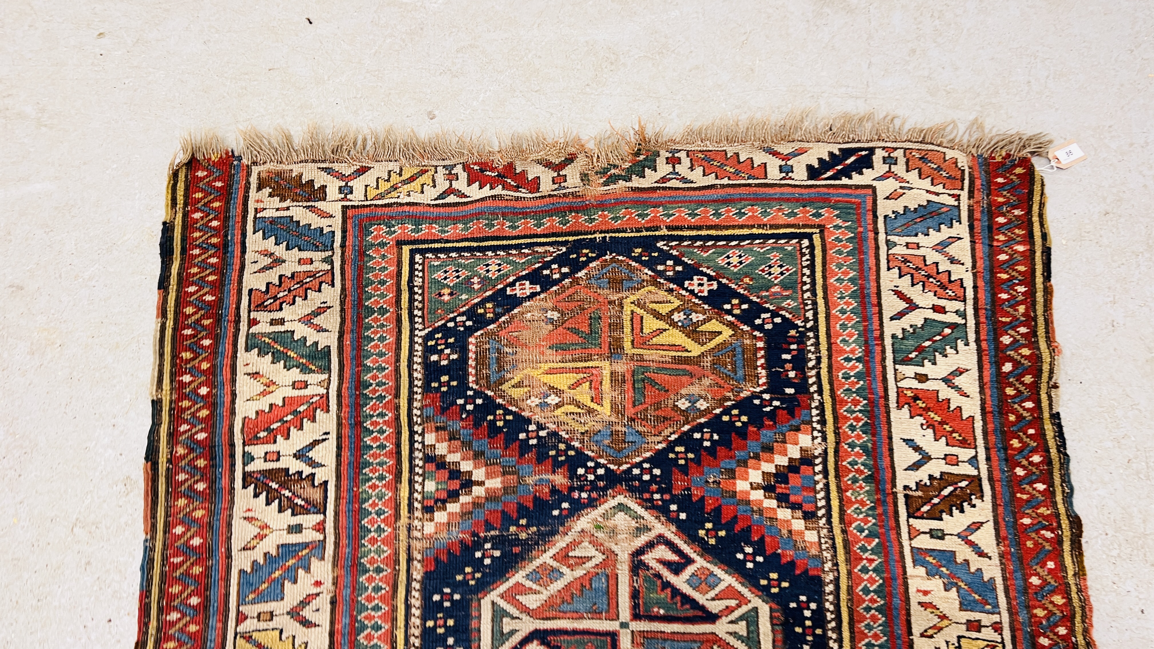 A TRADITIONAL CAUCASIAN RUNNER, POSSIBLY KAZAK, THE CENTRAL LOZENGES DIVIDED BY TRIANGULAR DESIGNS, - Image 6 of 8