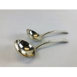 A PAIR OF GEORGE III OLD ENGLISH PATTERN SILVER SAUCE LADLES.