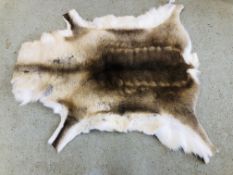 A DEER SKIN RUG L 30CM X W 115CM.