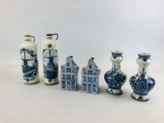 A PAIR OF DELFT VASES H 20CM, A PAIR OF DELFT DISTILLERY BOTTLES AND STOPPERS H 27CM.