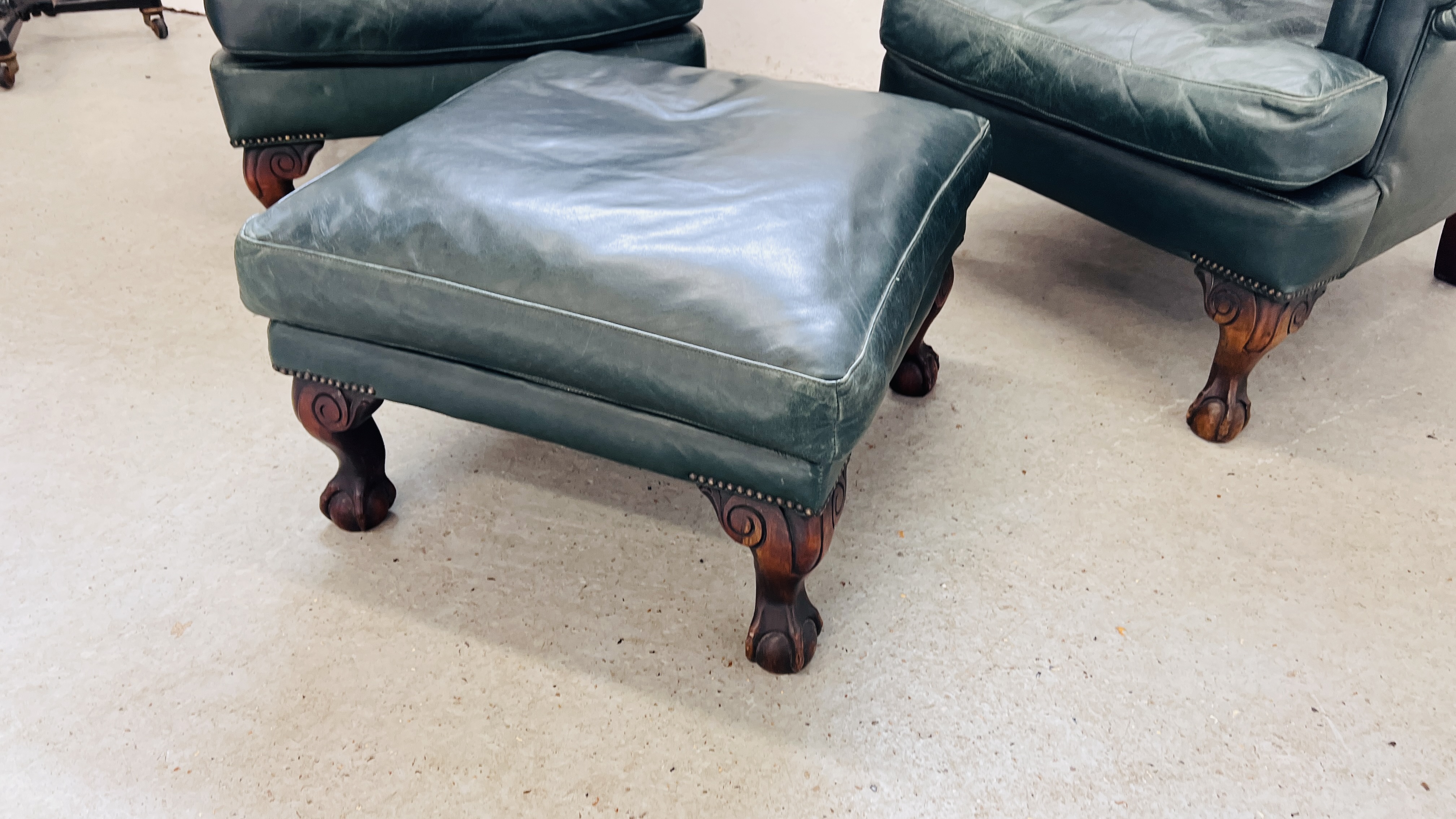 A PAIR OF MODERN BOTTLE GREEN LEATHER WING BACK FIRE SIDE ARMCHAIRS ON BALL AND CLAW FEET ALONG - Image 13 of 13