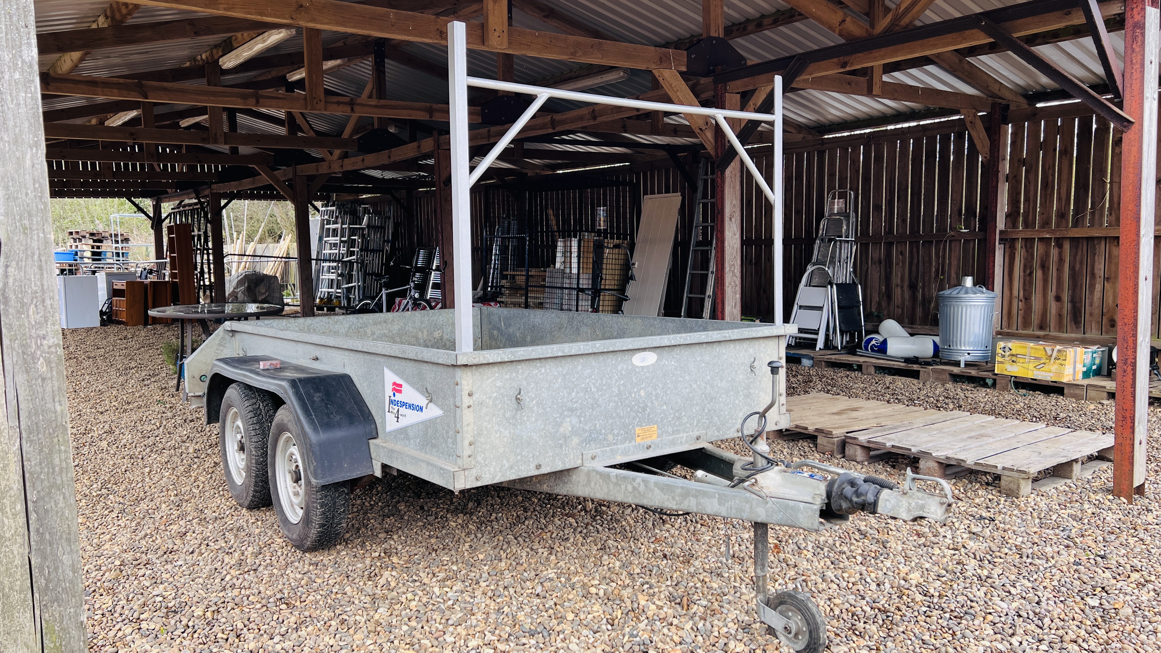 A TWIN AXLE 8FT X 5FT GALVERNISED INDESPENSION TRAILER - BREAKED 2300KG.