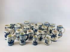 AN EXTENSIVE COLLECTION OF APPROX 23 DELFT TANKARDS OF VARYING SIZES.