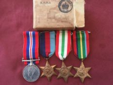 WW2 GROUP OF FOUR, STILL IN BOX OF ISSUE APPARENTLY AWARDED TO F. BRANNAN (NAVAL GROUP) R.N.