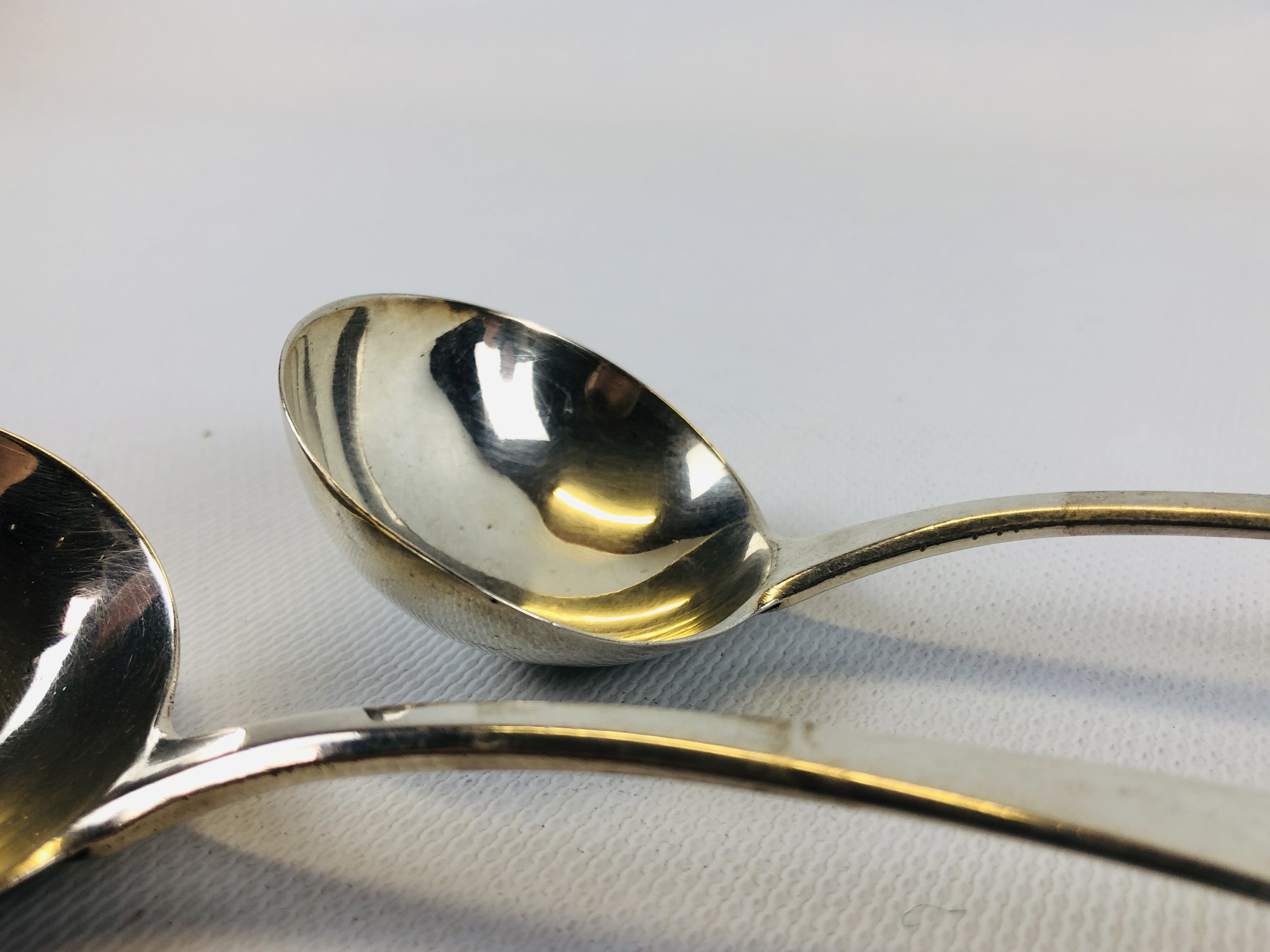 A PAIR OF GEORGE III OLD ENGLISH PATTERN SILVER SAUCE LADLES. - Image 3 of 7