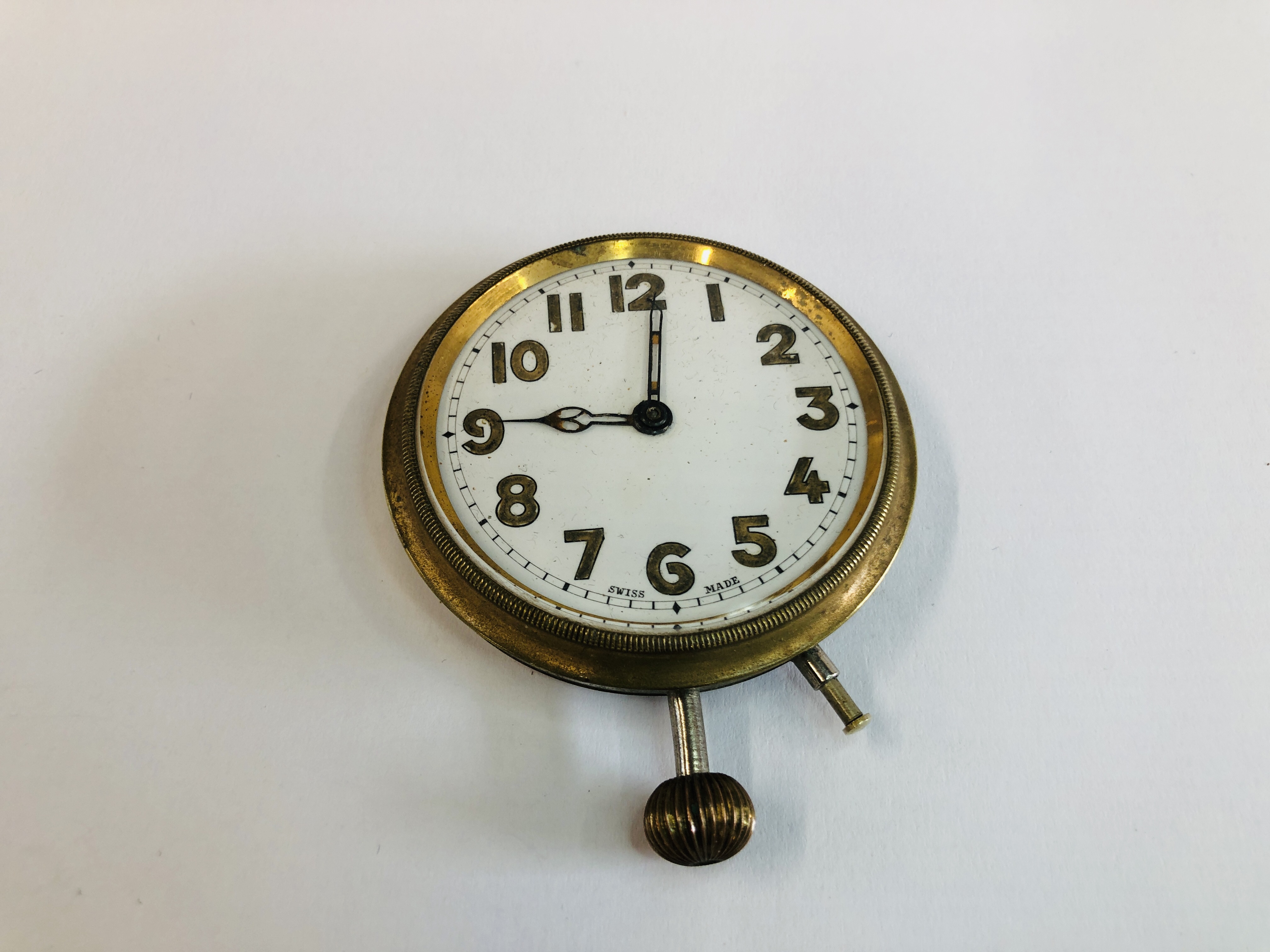 A VINTAGE SWISS MADE POCKET WATCH WITH ENAMEL DIAL.