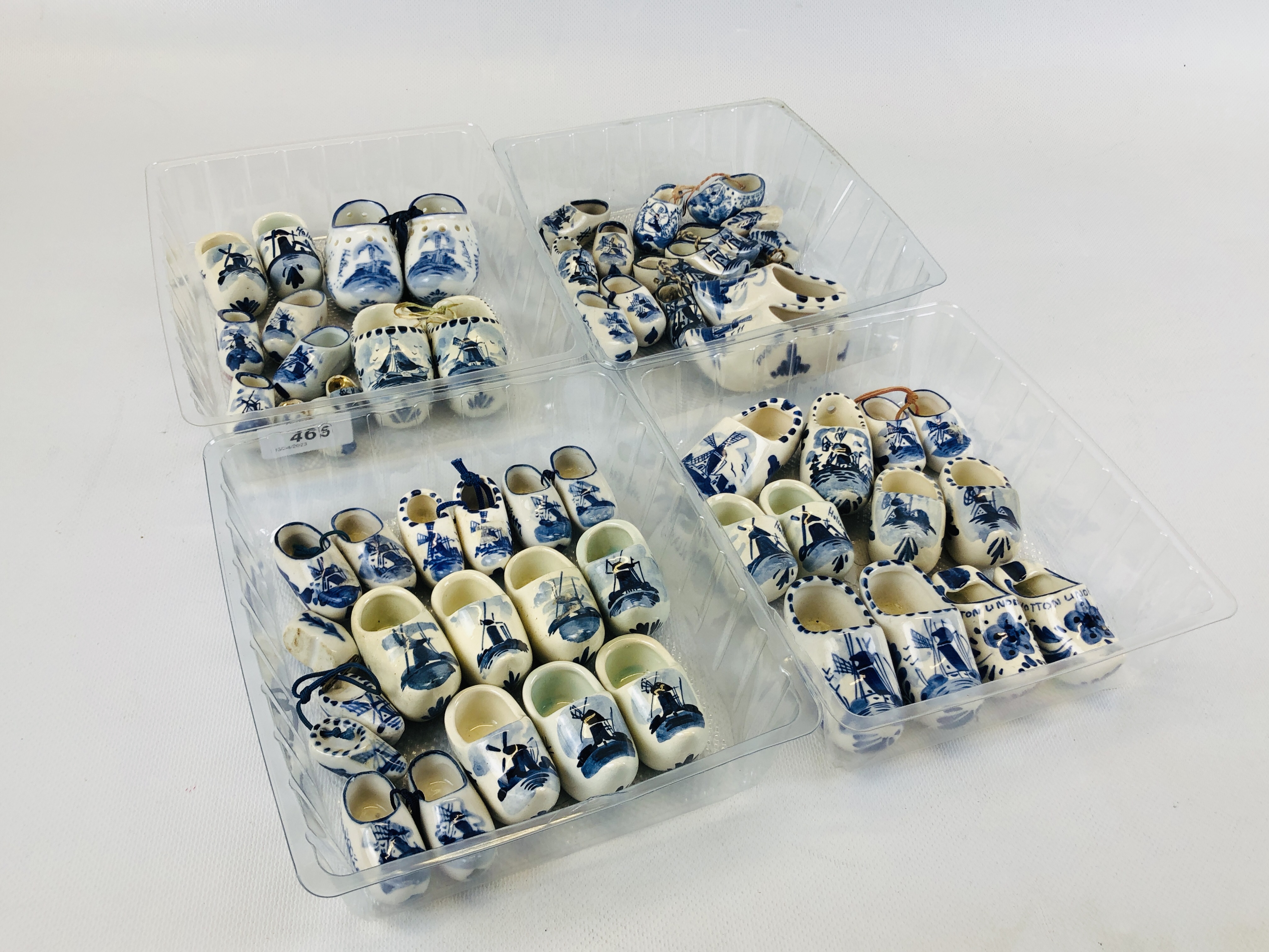 AN EXTENSIVE COLLECTION OF MINIATURE DELFT CLOGS.