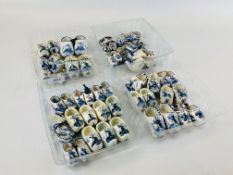 AN EXTENSIVE COLLECTION OF MINIATURE DELFT CLOGS.