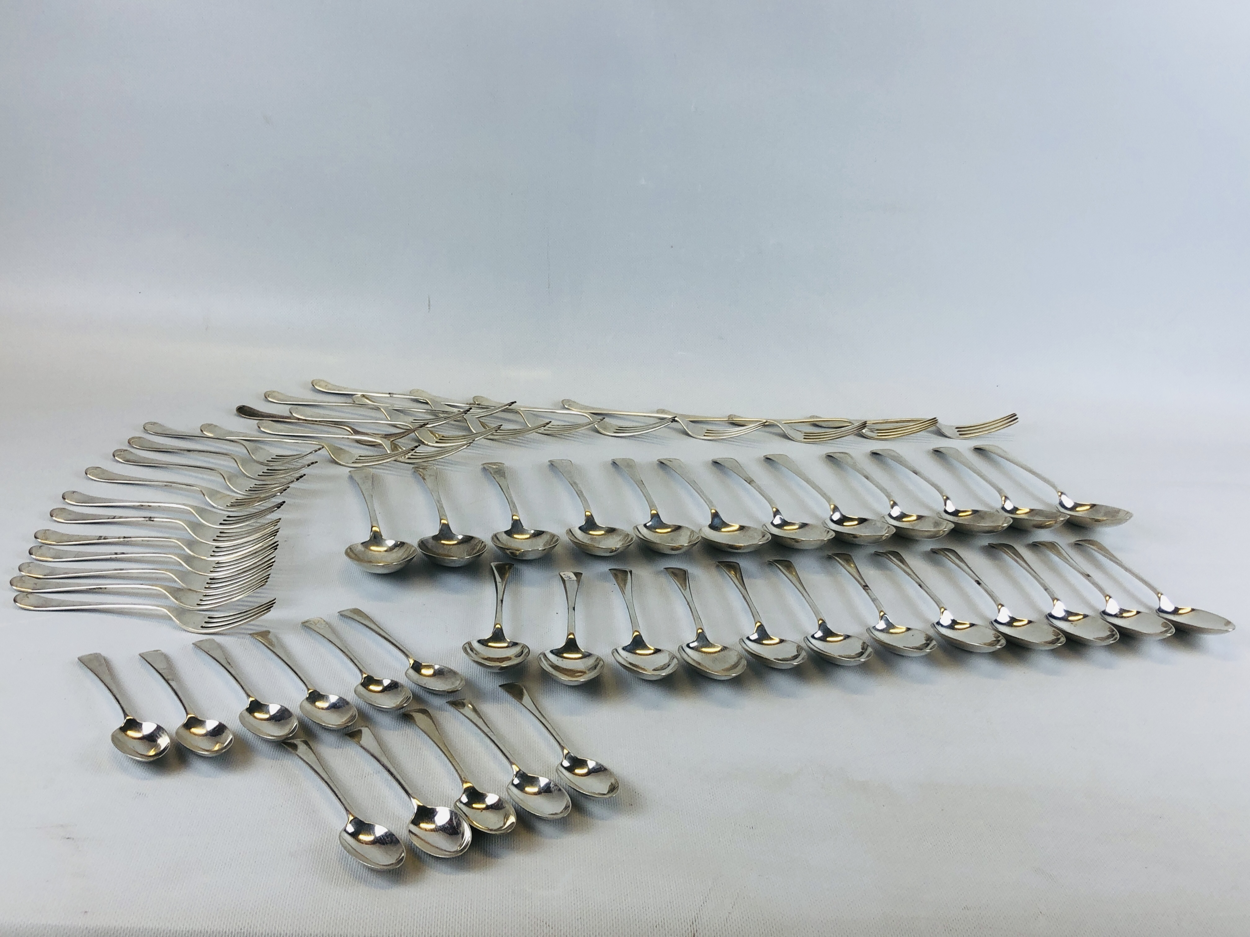 AN OLD ENGLISH PATTERN SILVER CANTEEN: 12 SERVING SPOONS, 12 DESSERT SPOONS, 12 TABLE FORKS,