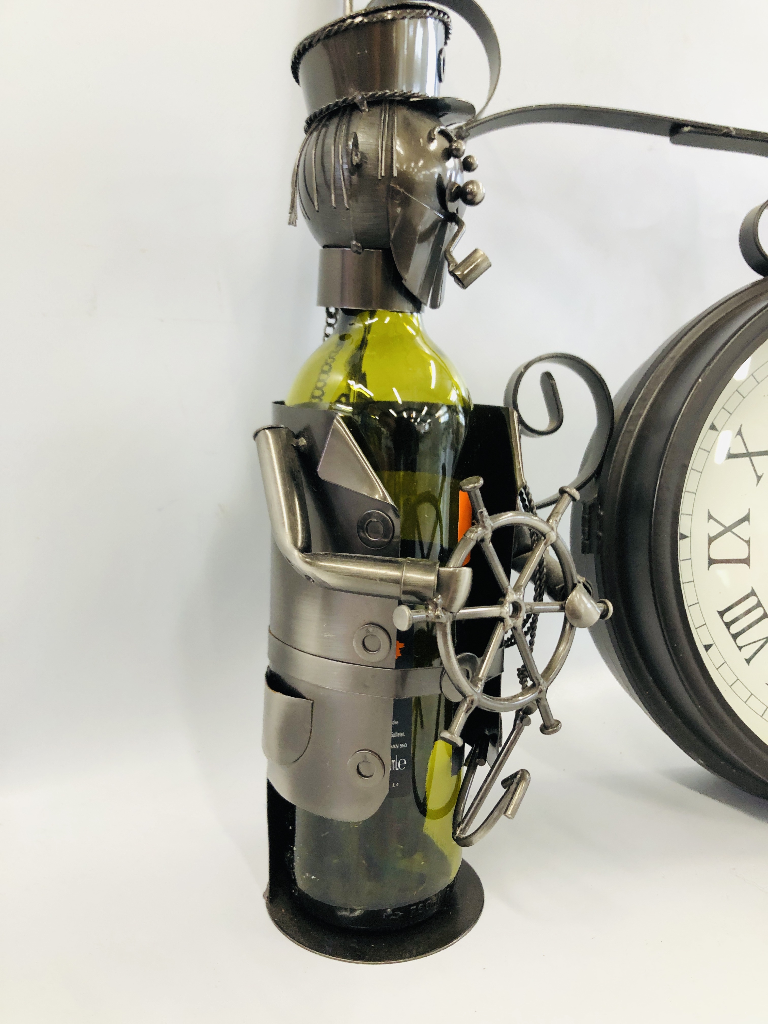 A REPRODUCTION GARDEN CLOCK ON BRACKET MOUNT AND TWO METAL CRAFT WINE BOTTLE HOLDERS (BOTTLES - Image 3 of 4