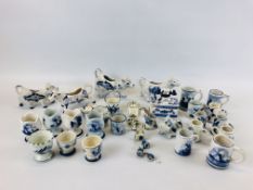 A COLLECTION OF ASSORTED DELFT WARES TO INCLUDE EGG CUPS,