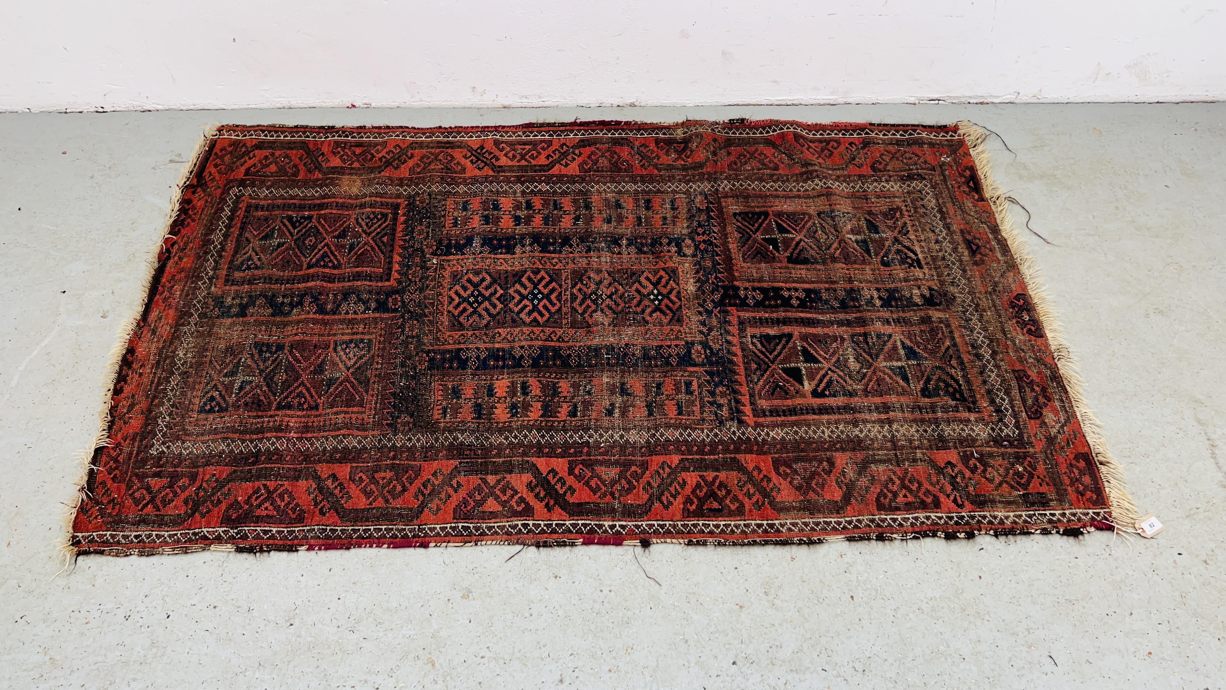 A TRADITIONAL AFGHAN RUG,