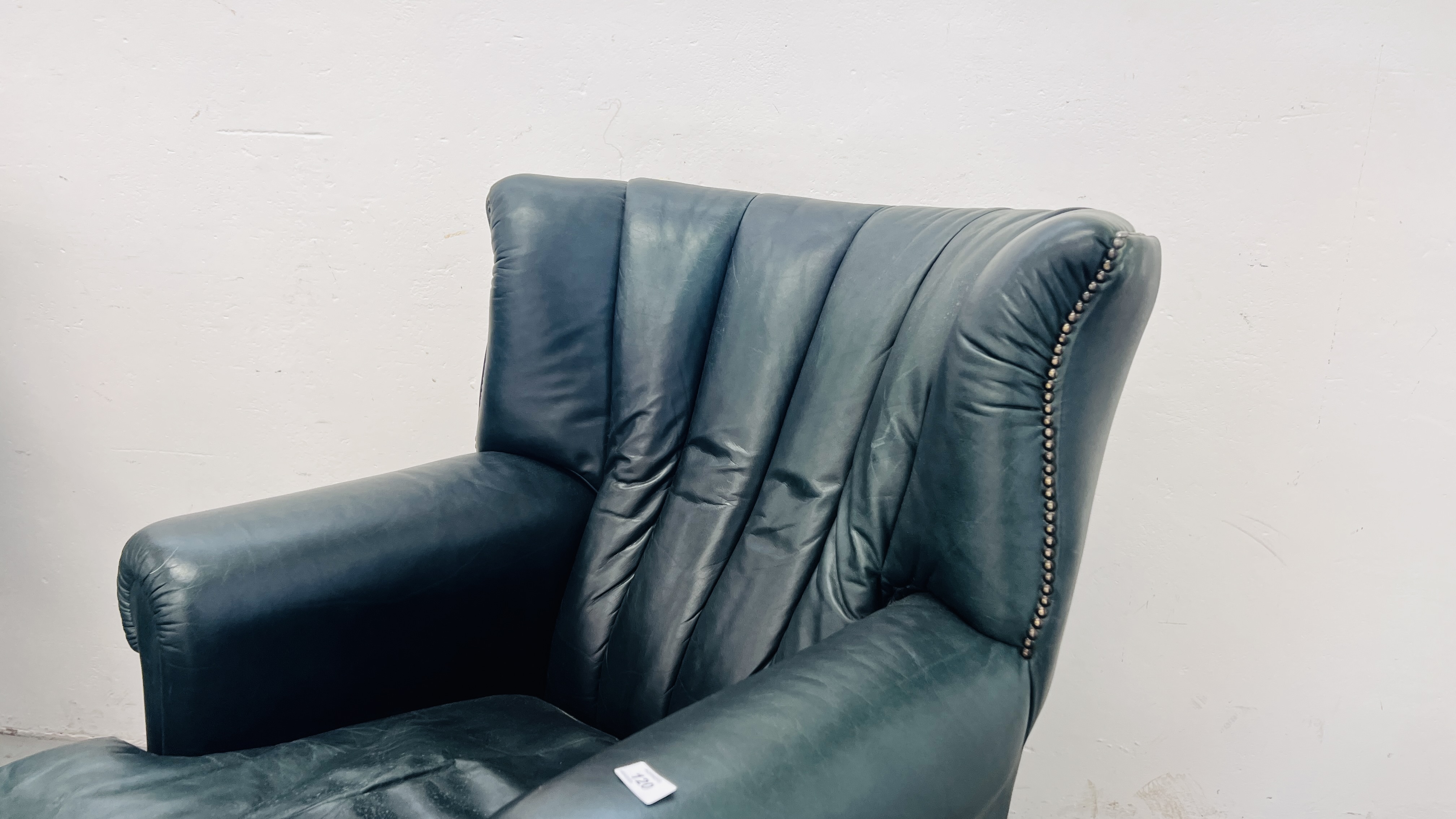 A PAIR OF MODERN BOTTLE GREEN LEATHER WING BACK FIRE SIDE ARMCHAIRS ON BALL AND CLAW FEET ALONG - Image 11 of 13