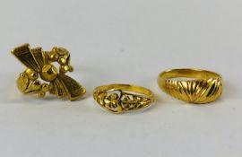3 X HAND MADE EASTERN STYLE YELLOW METAL RINGS.