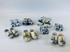 A GROUP OF ASSORTED DELFT CLOGS TO INCLUDE SOME PAIRS.