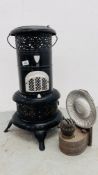 A VALOR 525-R PARAFIN HEATER + 1 OTHER OIL LAMP.