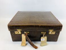 A VINTAGE CROCODILE FINISH LEATHER COMBINATION TRAVELLING VANITY / LUGGAGE CASE,