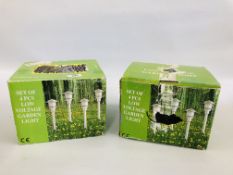 2 BOXED AS NEW 4 PC LOW VOLTAGE GARDEN LIGHT SET - SOLD AS SEEN.