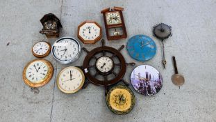 A GROUP OF ASSORTED WALL CLOCKS TO INCLUDE A CUCKOO CLOCK AND A SHIP WHEEL EXAMPLE ETC.
