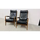 A PAIR OF RETRO CONTEMPORARY BLACK FAUX LEATHER EASY STYLE CHAIR BEARING ORIGINAL MAKERS LABEL