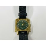 A LADIES RETRO SARCAR WRIST WATCH WITH GREEN COLOURED DIAL ON LEATHER STRAP.