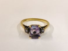 AN AMETHYST RING WITH RECTANGULAR STONE,