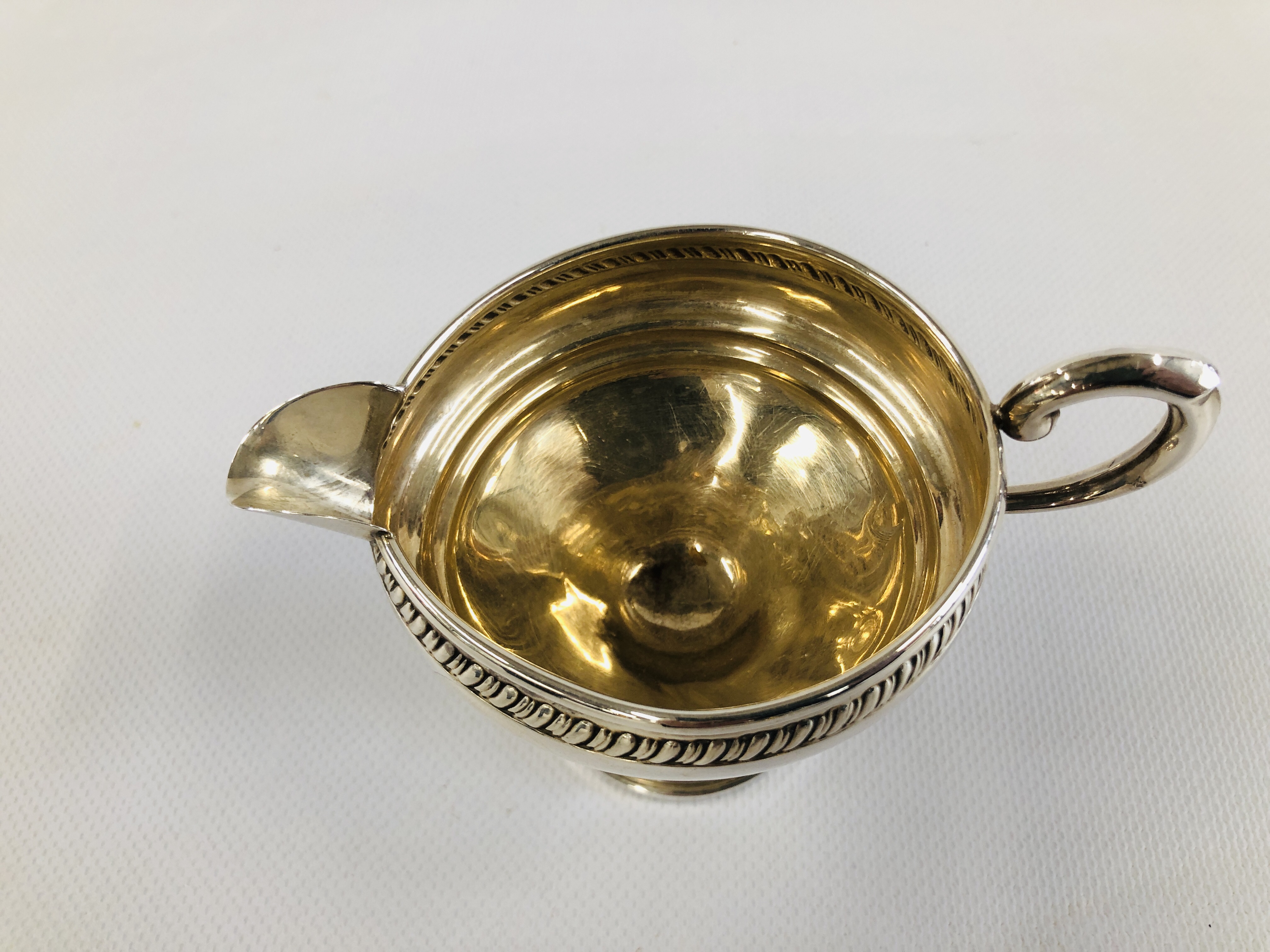 A DECORATIVE CREAM JUG AND MATCHING TWO HANDLED SUGAR BOWL MARKED "CROWN" STERLING. - Image 8 of 13