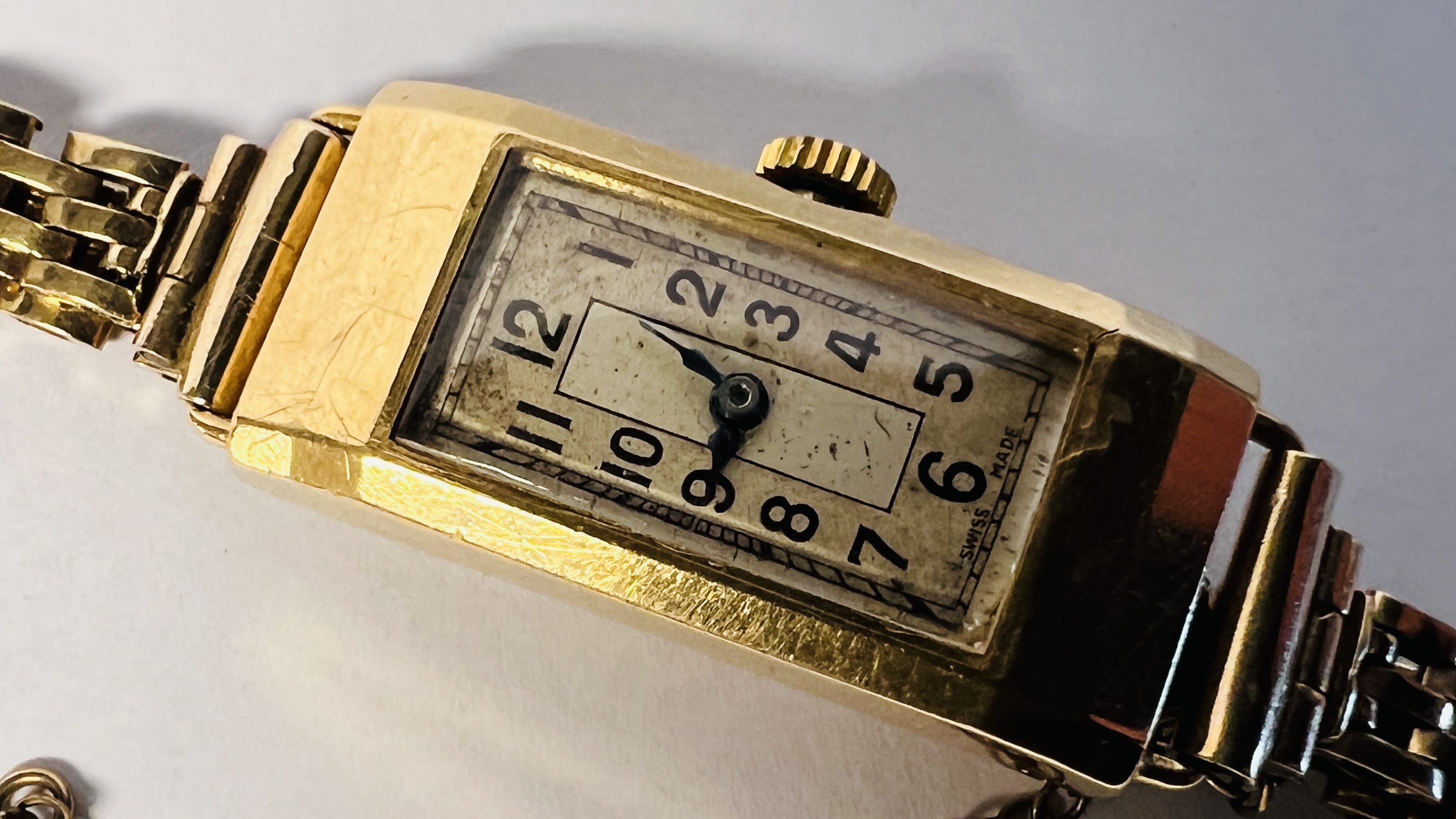 A LADIES 18CT GOLD CASED COCKTAIL WATCH WITH SWISS MOVEMENT ON 9CT GOLD BRACELET. - Image 15 of 44