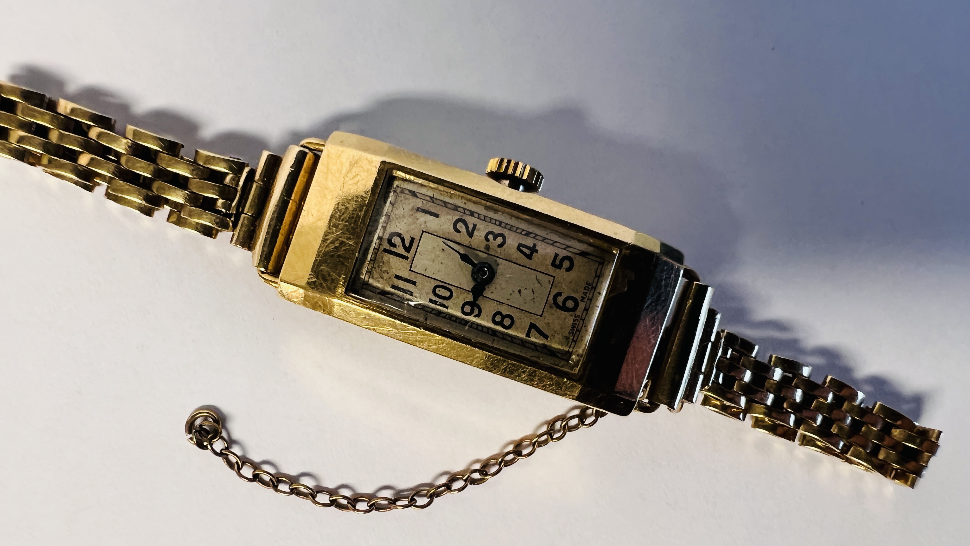 A LADIES 18CT GOLD CASED COCKTAIL WATCH WITH SWISS MOVEMENT ON 9CT GOLD BRACELET. - Image 16 of 44