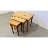 NEST OF THREE GRADUATED PINE TABLES.