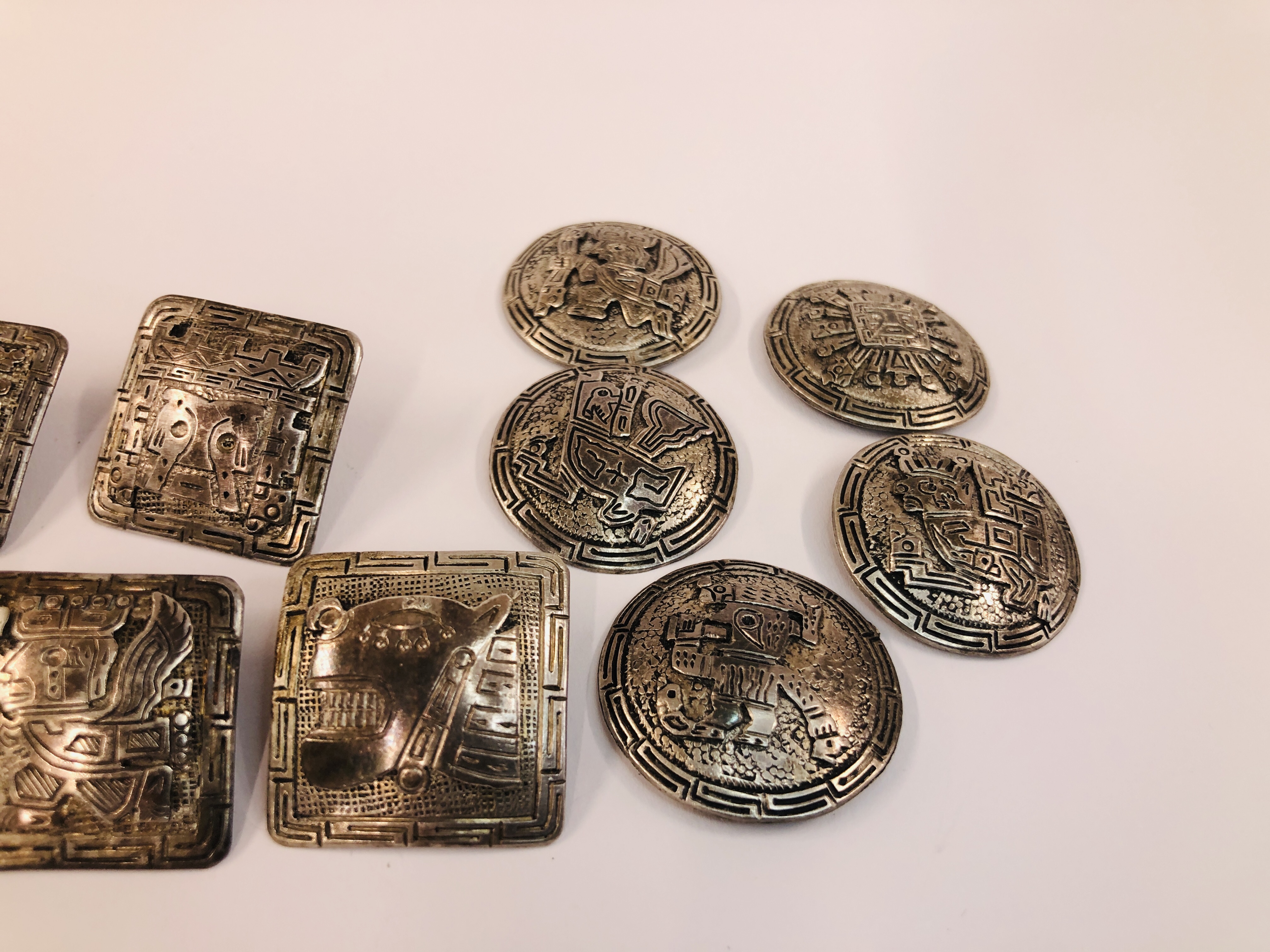 ELEVEN WHITE METAL SOUTH AMERICAN BUTTONS, - Image 4 of 6
