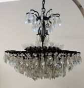 AN IMPRESSIVE ANTIQUE CHANDELIER WITH GLASS DROPLETS - APPROX DIAMETER 85CM X APPROX HEIGHT 75CM -