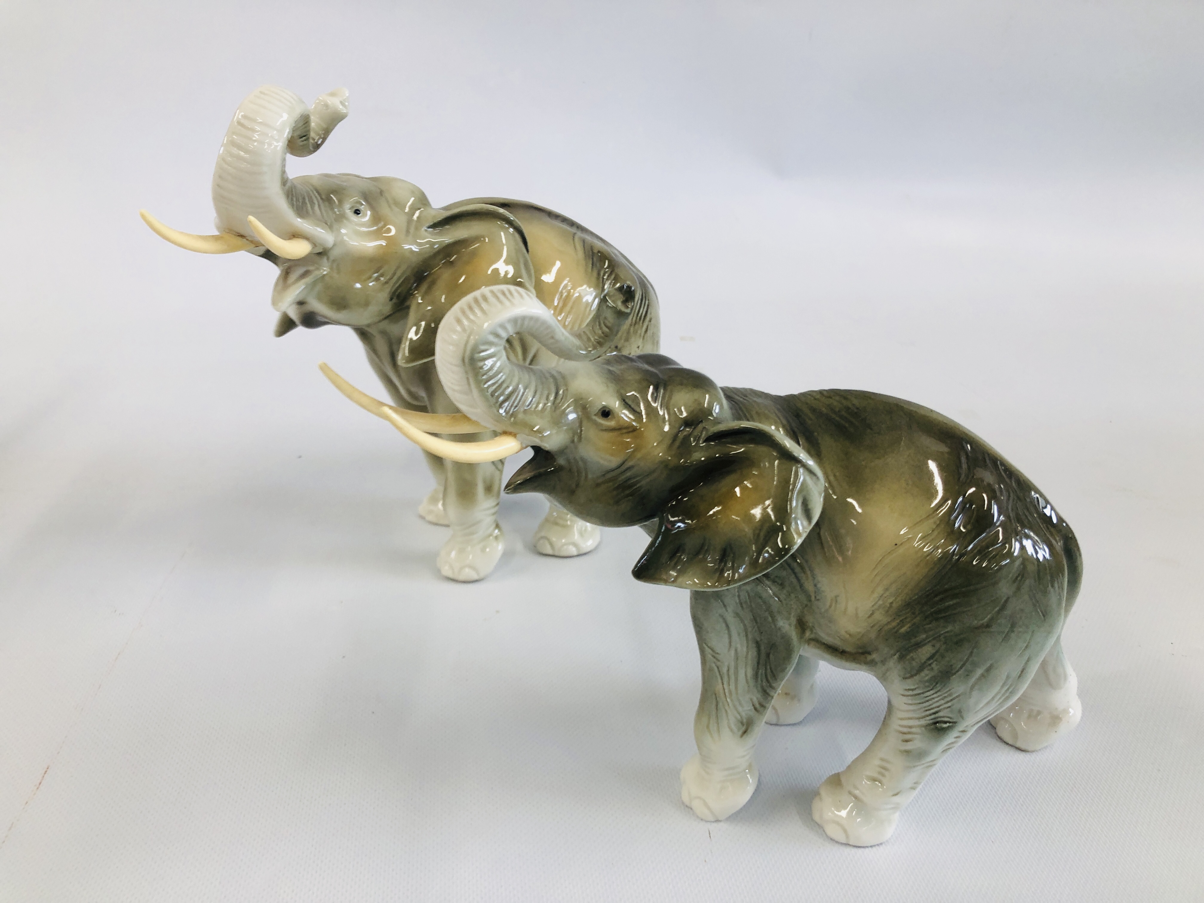 TWO ROYAL DUX ELEPHANTS 3782, 91 H 20CM & 3783, 64 H 24CM.