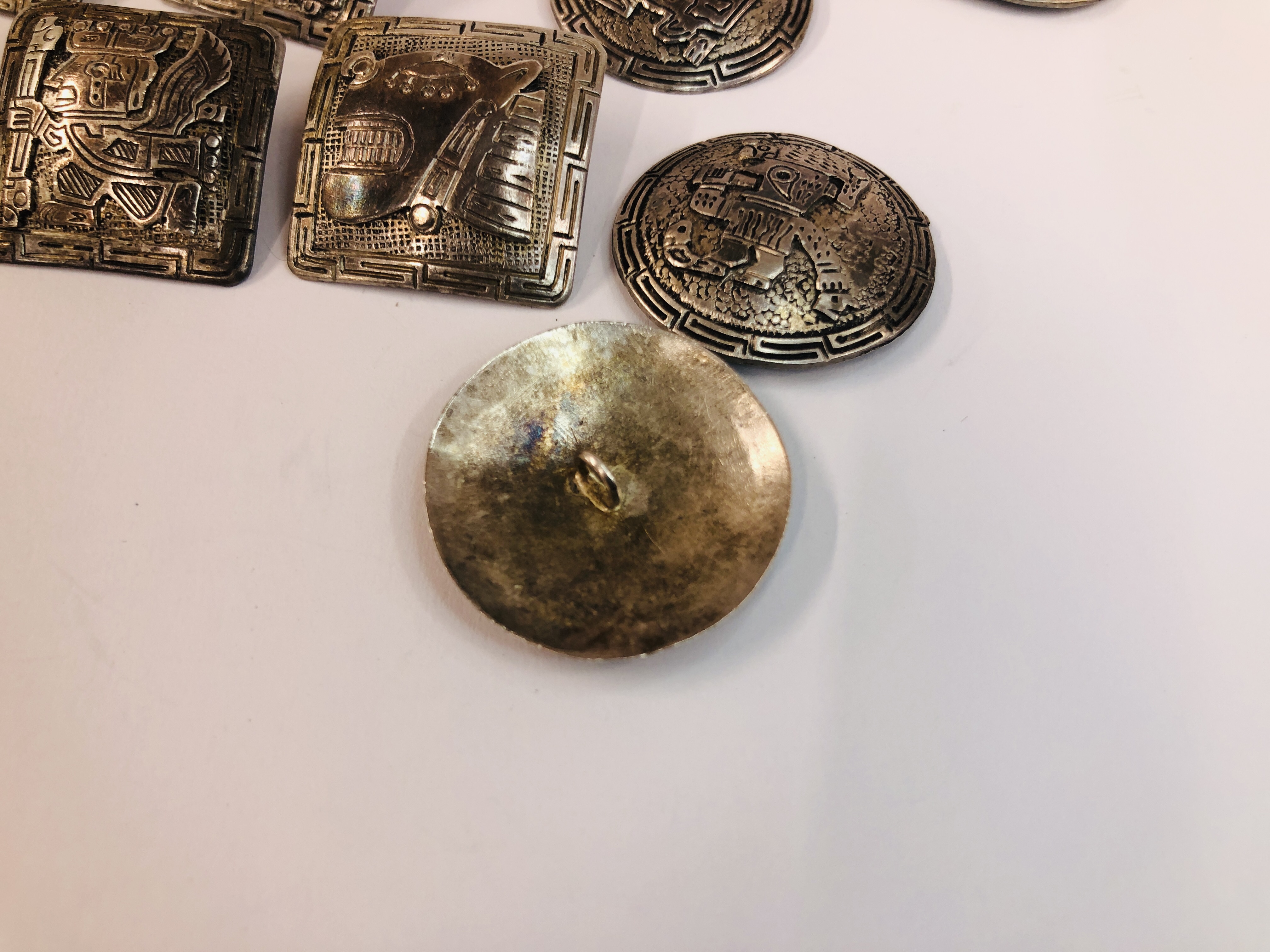 ELEVEN WHITE METAL SOUTH AMERICAN BUTTONS, - Image 6 of 6