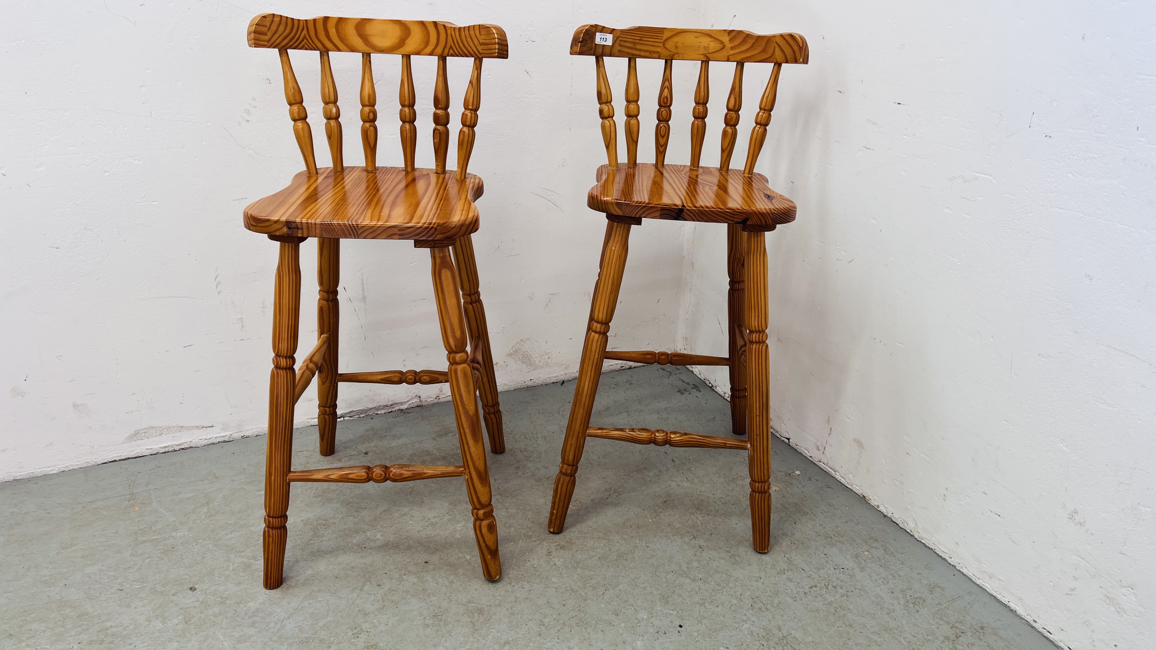 PAIR OF HONEY PINE BREAKFAST BAR CHAIRS.