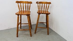 PAIR OF HONEY PINE BREAKFAST BAR CHAIRS.