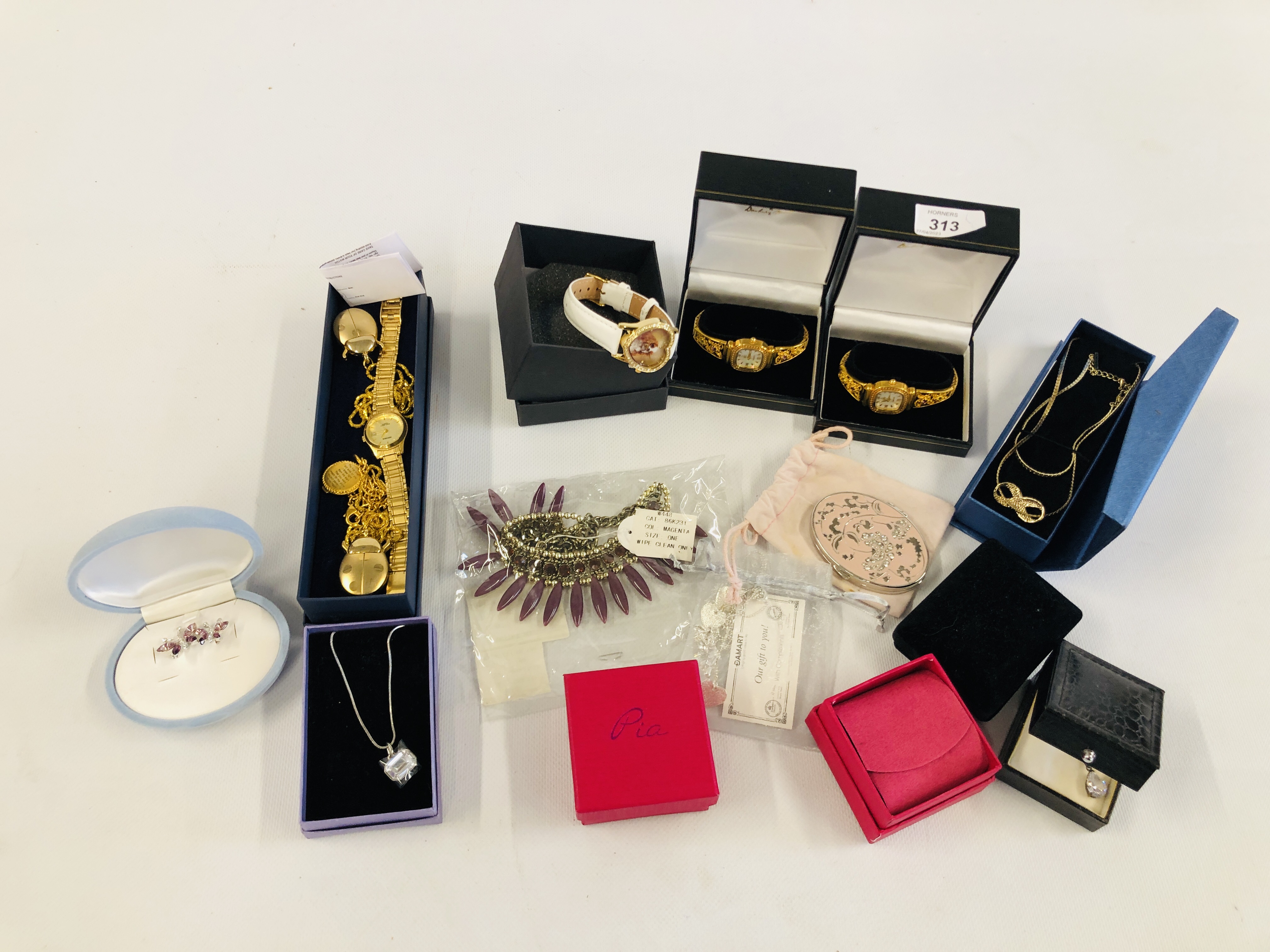 A BOX OF ASSORTED GOOD QUALITY COSTUME JEWELLERY TO INCLUDE DESIGNER BRANDED WRIST WATCHES,